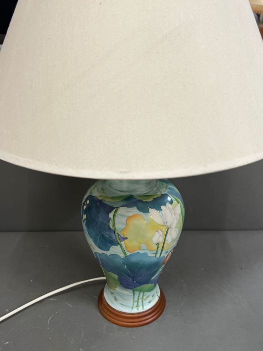 A painted table lamp