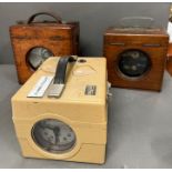 Three vintage cased meters
