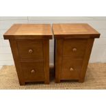 Pair of contemporary oak two drawer bedside tables (H 70cm x W 46cm x D 40cm)
