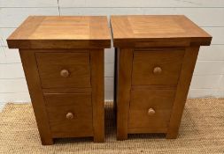 Pair of contemporary oak two drawer bedside tables (H 70cm x W 46cm x D 40cm)