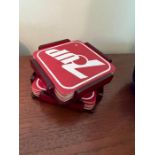 Vintage advertising 7UP coasters in red plastic holders