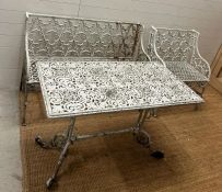 A Coalbrookdale style gothic revival garden bench and chair along with a scrolling table (Table