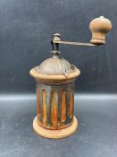 A vintage F.B. crossed swords coffee grinder