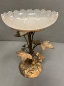A gilded stand with glass bowl with the metal work stand depicting strawberries