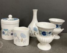 A selection of Wedgwood bone china dressing table pots and vases