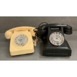 Two vintage telephones to include a bakelite rotary in black