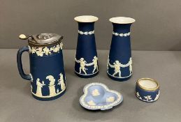 Wedgwood Jasperware to include a pair of vases, a lidded jug and pin dishes