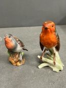 Two porcelain bird figurines