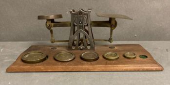 A set of vintage brass postal scales AF