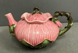 A vintage ceramic teapot in the form of fruit/flower