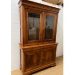 A glazed sideboard opening to three adjustable shelves and a double door cupboard to base (Two