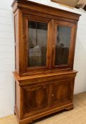 A glazed sideboard opening to three adjustable shelves and a double door cupboard to base (Two