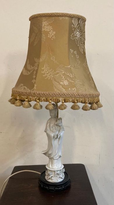 A Chinese style ceramic figurine table lamp