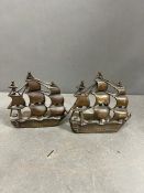A pair of brass ship themed bookends