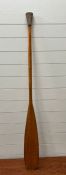 A wooden paddle