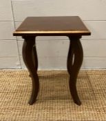 A small mahogany side table