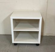 A small Ikea side table on castors (H58cm W52cm D40cm)