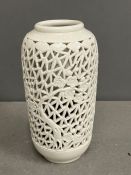 A white pierced vase/jar