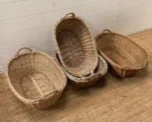 Two large two handled wicker baskets