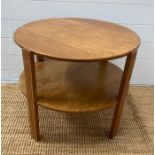 A circular Mid Century end table with shelf under (H52cm Dia62cm)