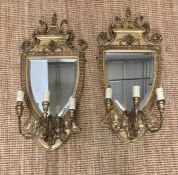 A pair of Victorian gilt gesser three branch girondelles in the manner of Robert adams of shield