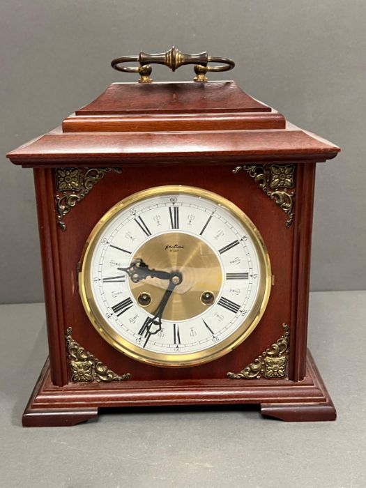 A mantel clock with Westminster chime (25cm x 28cm)