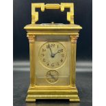 Eight day Grande Sonnierre French carriage clock in a bronze case. C1900 H25cm handle raised