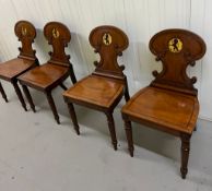 A Set of four Regency Hall chairs in the manner of Gillows c1825