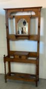 An Arts and Crafts hall stand with central mirror, barely twist supports (W 100cm x D 33cm x H