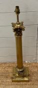 A brass Corinthian column lamp