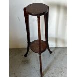 An oak plant stand on out swept legs (H81cm Dia22cm)