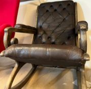 A Chesterfield brown rocking chair