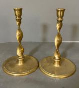 A Pair of Georgian brass twisted candlesticks Height 24cm