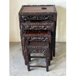 A set of four carved Hung-Mu wood nesting tables (H72cm W50cm D37cm)