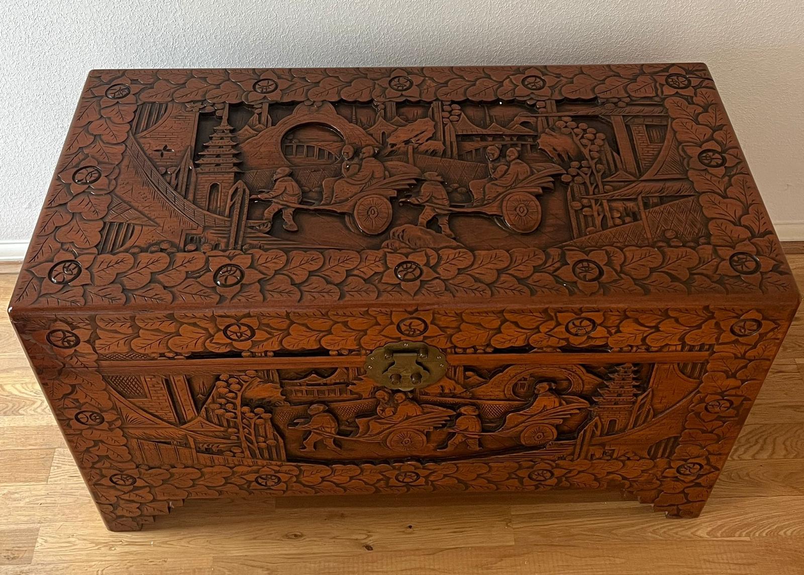An ornately carved camphor wood chest (H 60cm x D 50cm x W 102cm) - Image 2 of 11