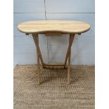 A pine kidney shaped foldable table (H66cm)