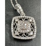 18 carat white gold diamond set pendant marked on the bale D0.358 18K 750 suspended on a 9 carat