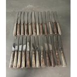 A set of Swiss silver handled knives and butter knives, twelve of each hallmark to handle