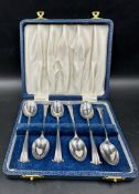 A boxed set of six silver teaspoons, hallmarked for Sheffield 1902 by Thomas Bradbury & Son