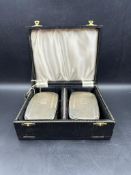 A boxed set of silver brushes, hallmarked for Birmingham 1966 by makers mark B & Co