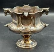 A Hallmarked silver trophy by Simmons Silversmiths of Cheltenham, marked to base. Engraved for