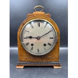 A George III style walnut bracket form mantel clock retailed by John Mason