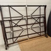 A wrought iron bed frame with leather strapping detail (headboard W182cm H150cm Foot H100cm)