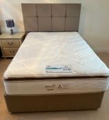 A double bed with Sealy ultimate gel 2200 mattress with button back headboard with drawers to base