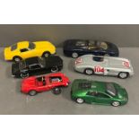 A selection of six diecast vehicles, sports vehicles.