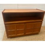 A Mid Century Nathan sideboard with a single shelf and two door cupboard under (H77cm W104cm D45cm)