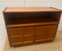 A Mid Century Nathan sideboard with a single shelf and two door cupboard under (H77cm W104cm D45cm)