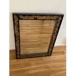 An ornate framed mirror, hardwood (56cm x 73cm)