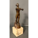 An Art Deco bronze nude of a lady emerging on a marble plinths (H33cm)