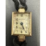 A vintage Rolex ladies wristwatch with rectangular dial naming Dobbies of Narobi AF